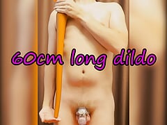 Young guy in chastity cage put very long 60cm dildo in the ass
