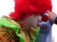 Gorgeous Blonde Jodie Moore Lets a Creepy Clown Pound Her Asshole Before Tasting His Cum