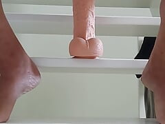 Riding didlo with huge pink head